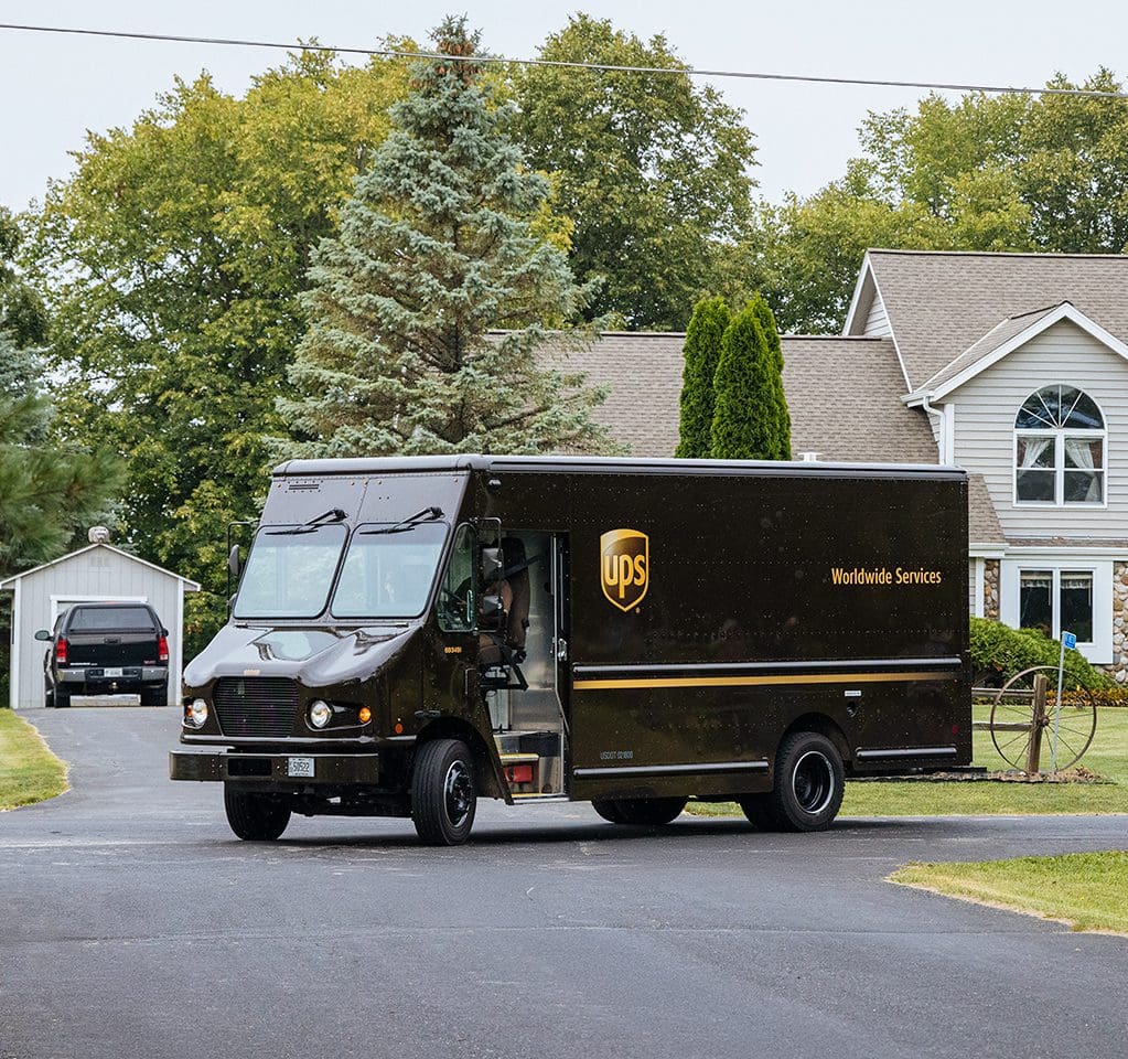 UPS truck parked near house