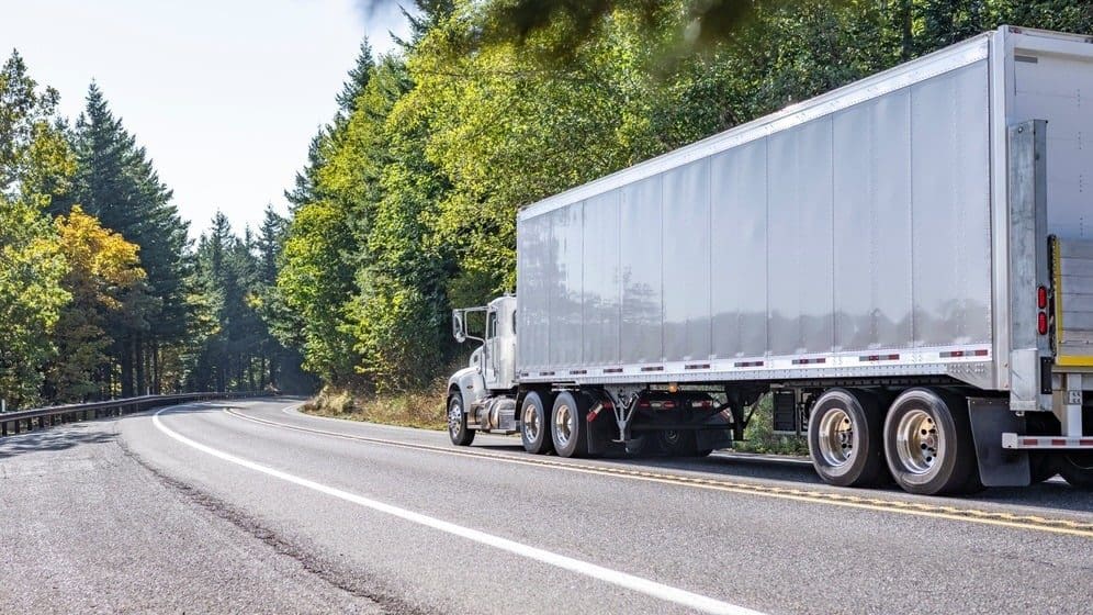 Large truck on a scenic road