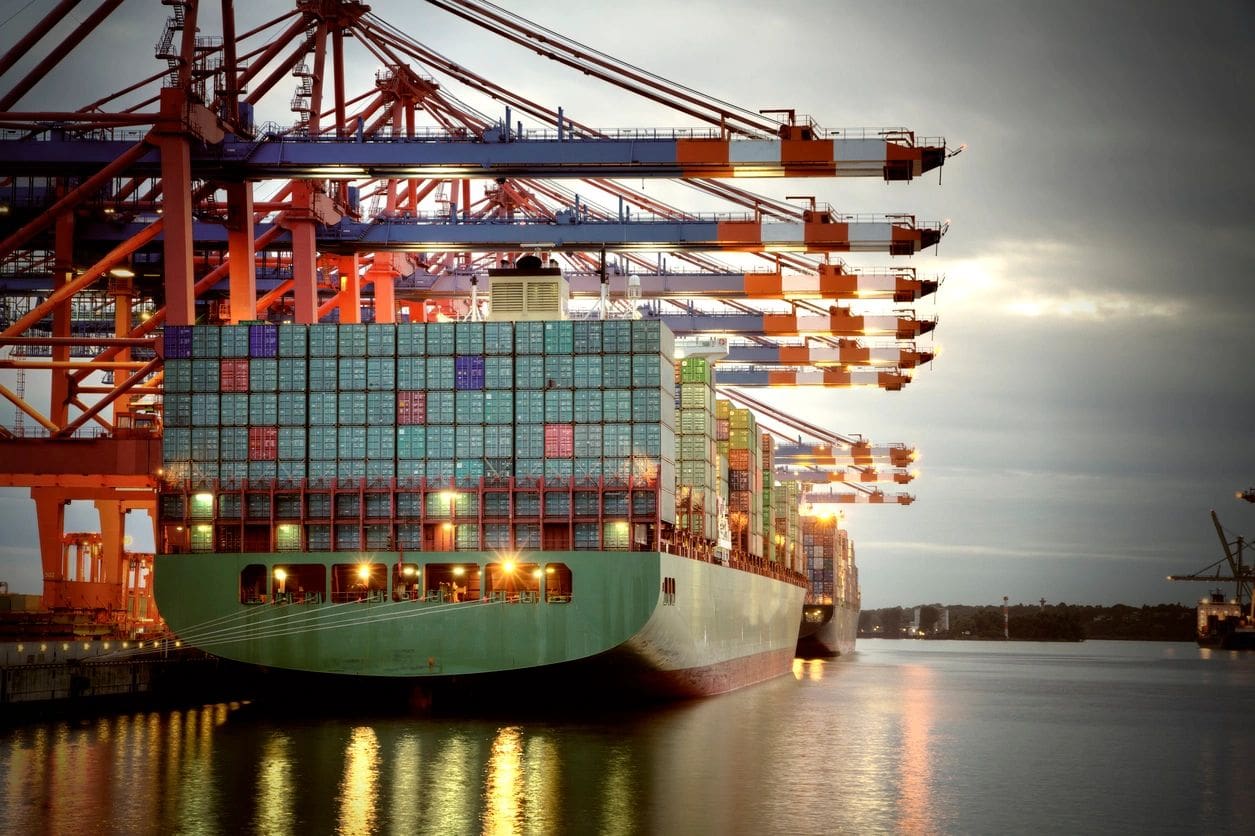 Container ship at busy port