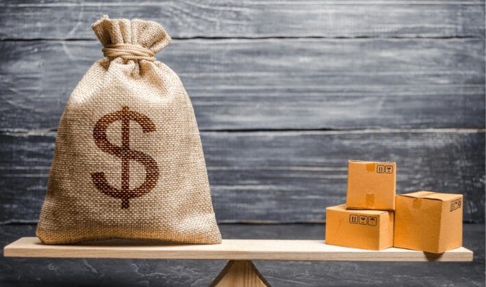 Financial balance concept with money and boxes