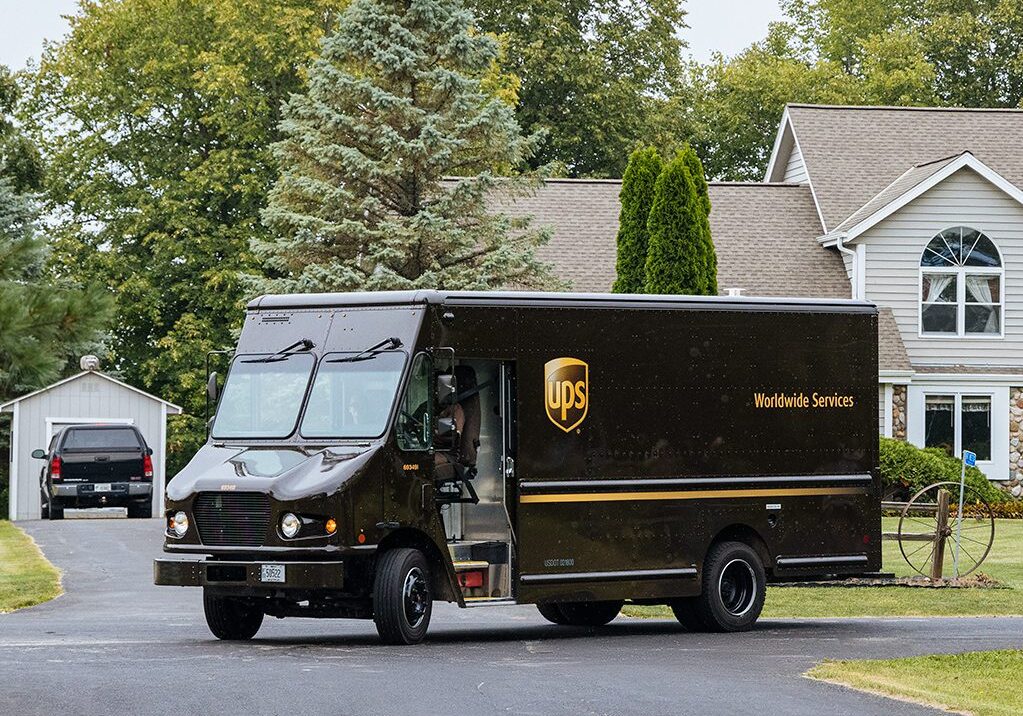 UPS truck parked near house