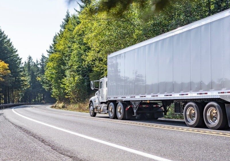 Large truck on a scenic road
