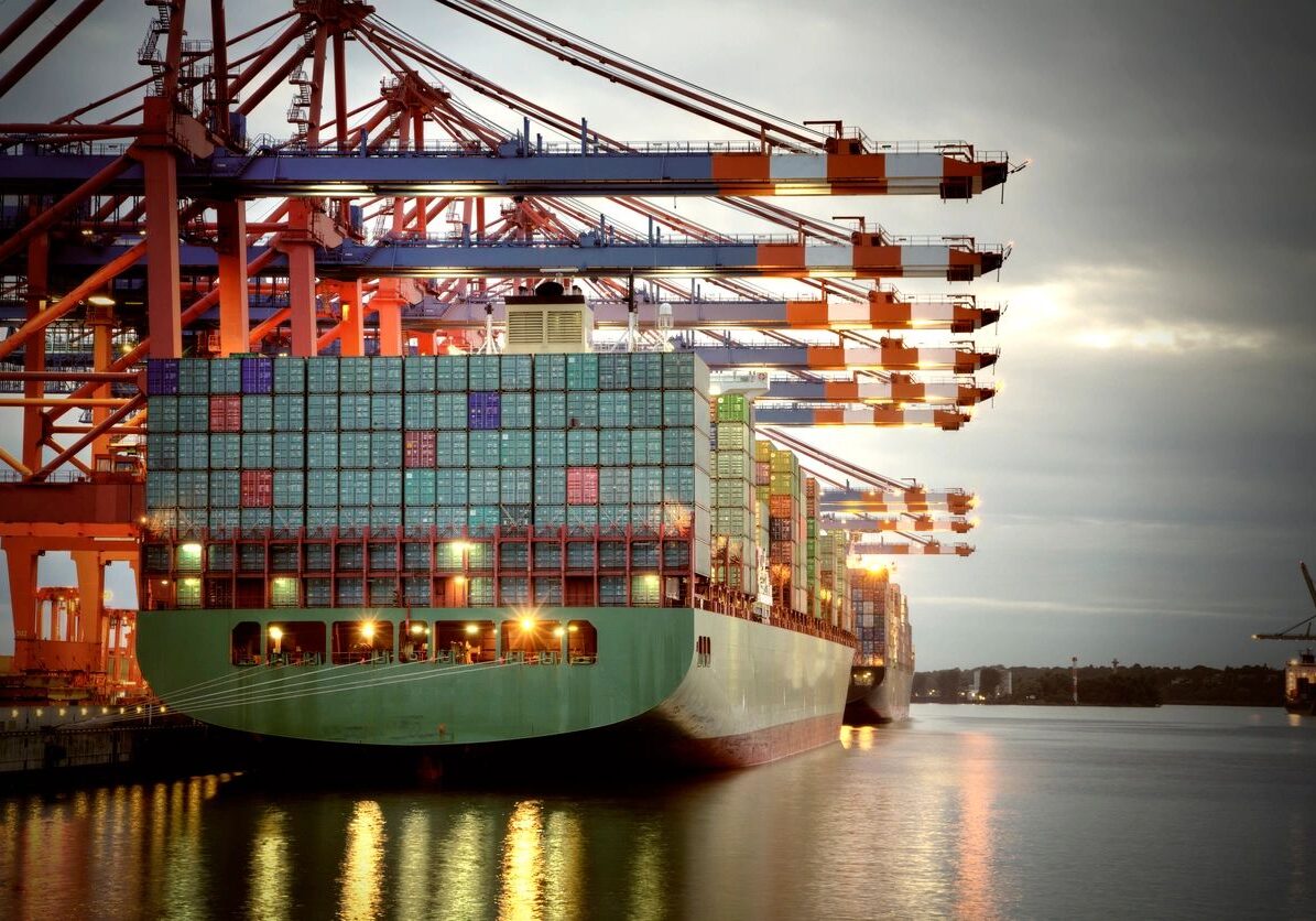 Container ship at busy port